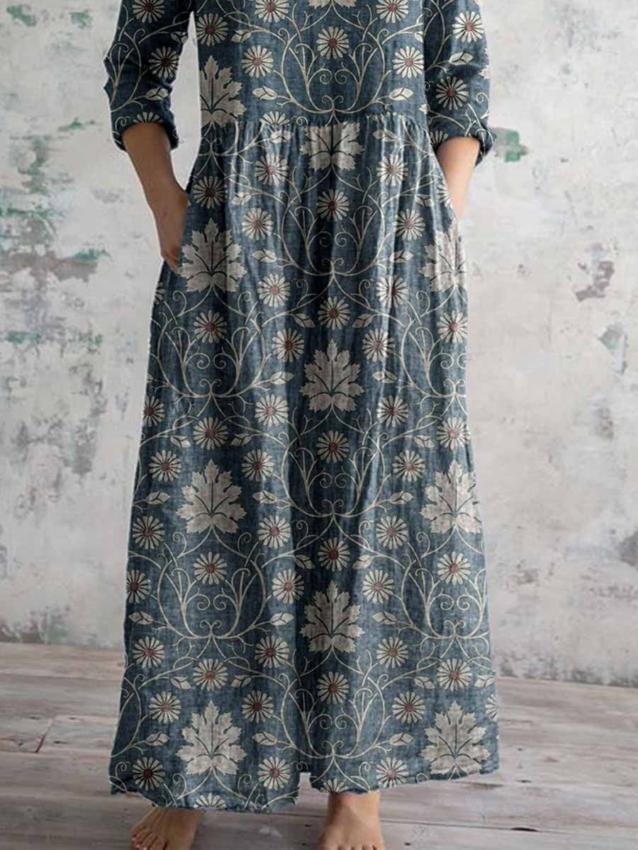 Elegant damklänning i bomull och linne med blommönster och fickor, vintagestil