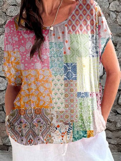 Damestop met geometrische print en pastorale print 