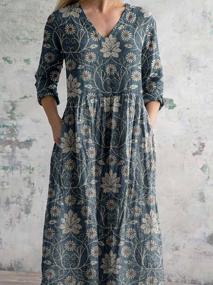 Elegant damklänning i bomull och linne med blommönster och fickor, vintagestil 