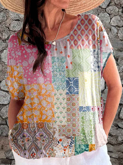 Damestop met geometrische print en pastorale print 