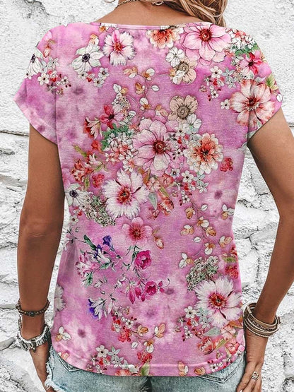Dames T-shirt met bloemenprint, ronde hals, korte mouwen en decoratieve knoopjes van katoen 