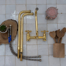 Load image into Gallery viewer, Enhance Your Kitchen with Handmade Unlacquered Brass Kitchen Faucets - Experience Timeless Elegance and Superior Craftsmanship